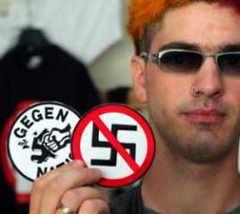 Jurgen Kamm sells anti-Nazi buttons