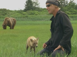 Tim Treadwell with Chocolate the bear and Ghost the fox